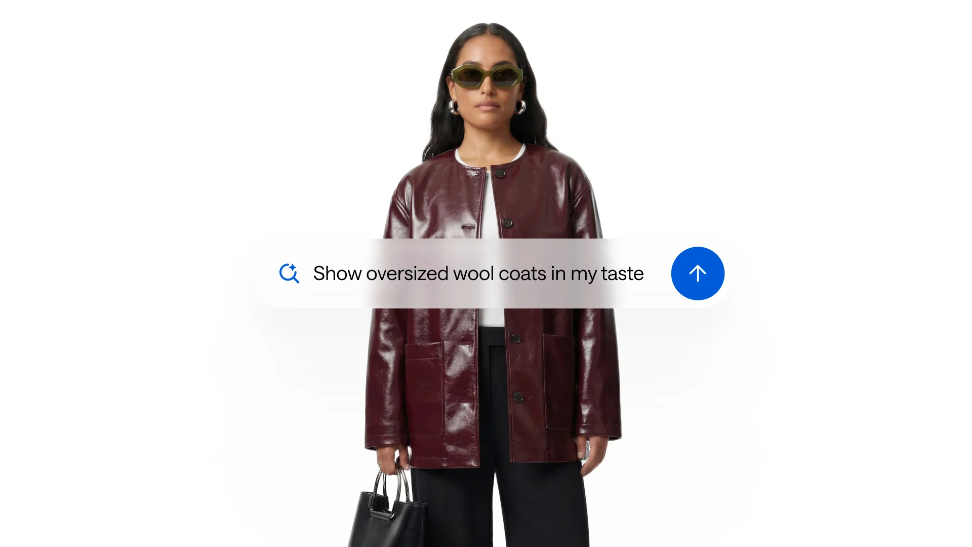 A person in a burgundy jacket with a conversational search UI overlay reading 'Show oversized wool coats in my taste'